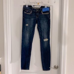 Hollister California size 28 good condition ripped dark wash jean legging